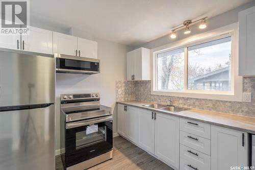 68 Young Crescent, Regina, SK - Indoor Photo Showing Kitchen With Stainless Steel Kitchen With Double Sink