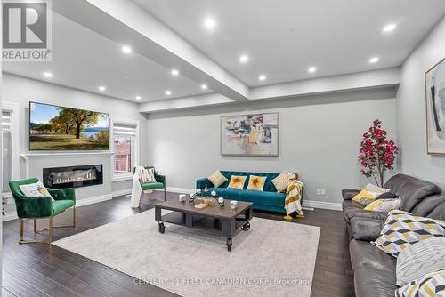 812 Jackpine Way, London, ON - Indoor Photo Showing Living Room With Fireplace