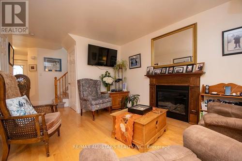 393 Elmwood Court, Oshawa (Samac), ON - Indoor Photo Showing Living Room With Fireplace