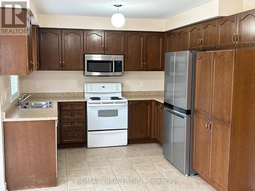 325 Vellore Avenue, Vaughan, ON - Indoor Photo Showing Kitchen With Double Sink