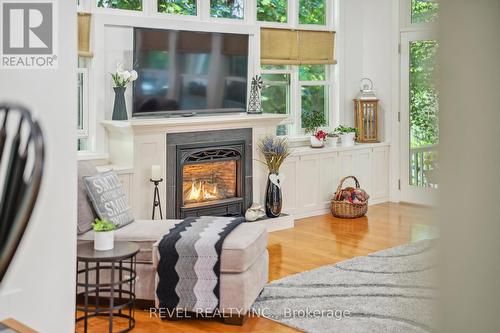 8181 Indian Trail, Guelph/Eramosa, ON - Indoor Photo Showing Living Room With Fireplace