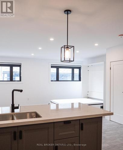 4 - 284 James Street N, Hamilton, ON - Indoor Photo Showing Kitchen With Double Sink