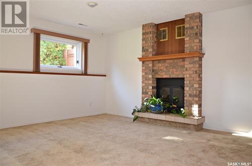 119 Bentham Crescent, Saskatoon, SK - Indoor With Fireplace