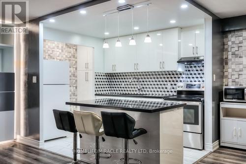 402 - 1950 Kennedy Road, Toronto, ON - Indoor Photo Showing Kitchen With Upgraded Kitchen