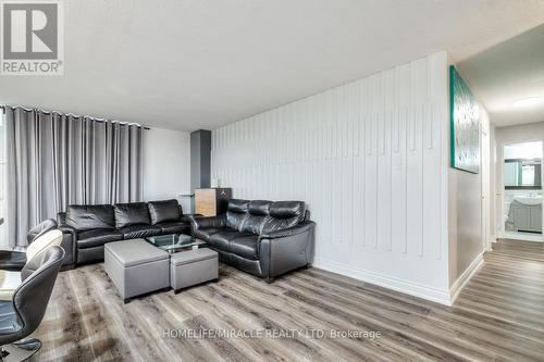 402 - 1950 Kennedy Road, Toronto, ON - Indoor Photo Showing Living Room