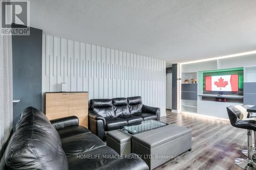 402 - 1950 Kennedy Road, Toronto, ON - Indoor Photo Showing Living Room