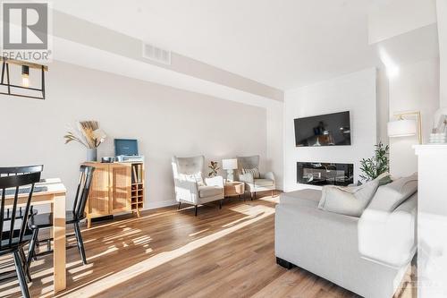 70 Franchise Private, Ottawa, ON - Indoor Photo Showing Living Room With Fireplace