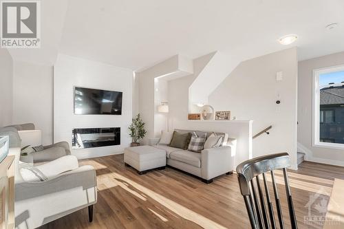 70 Franchise Private, Ottawa, ON - Indoor Photo Showing Living Room With Fireplace