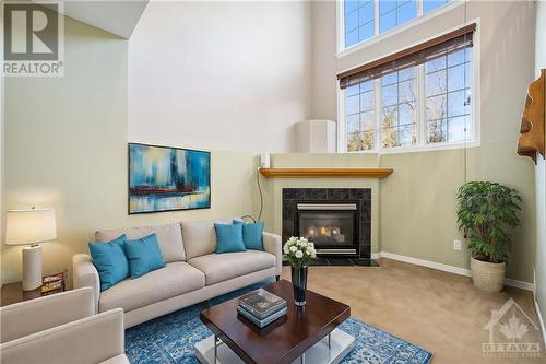 102 Briston Private, Ottawa, ON - Indoor Photo Showing Living Room With Fireplace