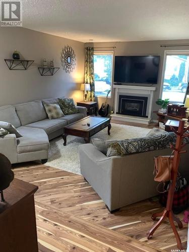 1224 Walker Street, Swift Current, SK - Indoor Photo Showing Living Room With Fireplace