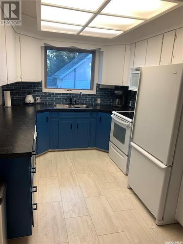 1224 Walker Street, Swift Current, SK - Indoor Photo Showing Kitchen With Double Sink