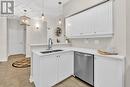 200 Manning Road Unit# 406, Tecumseh, ON  - Indoor Photo Showing Kitchen With Double Sink 