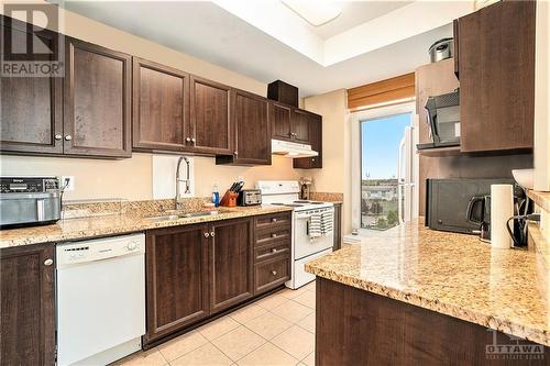 100 Roger Guindon Road Unit#701, Ottawa, ON - Indoor Photo Showing Kitchen With Double Sink