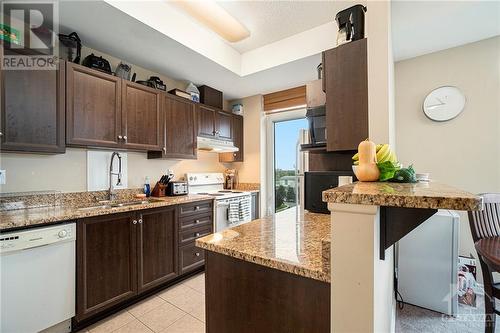 100 Roger Guindon Road Unit#701, Ottawa, ON - Indoor Photo Showing Kitchen With Double Sink