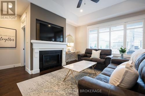 1 Sunrise Lane, Lambton Shores (Grand Bend), ON - Indoor Photo Showing Living Room With Fireplace