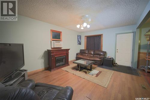 416 J Avenue S, Saskatoon, SK - Indoor Photo Showing Living Room With Fireplace