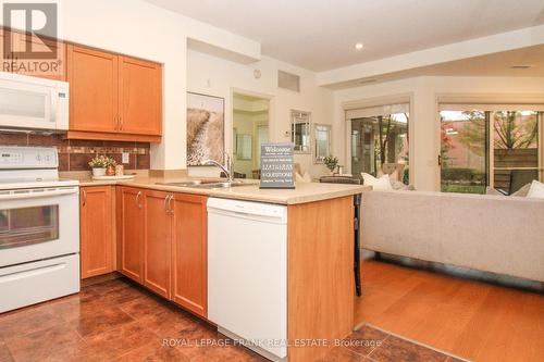 110 - 869 Clonsilla Avenue, Peterborough (Monaghan), ON - Indoor Photo Showing Kitchen With Double Sink