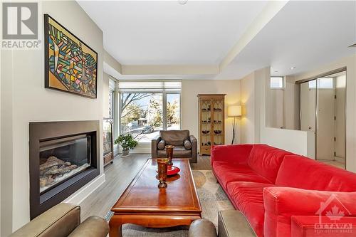 14 Holmwood Avenue, Ottawa, ON - Indoor Photo Showing Living Room With Fireplace