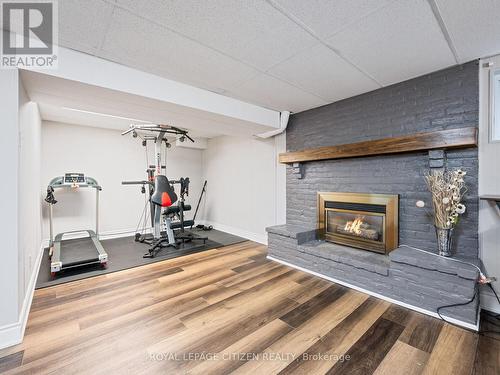 6063 Featherhead Crescent, Mississauga, ON - Indoor Photo Showing Gym Room With Fireplace