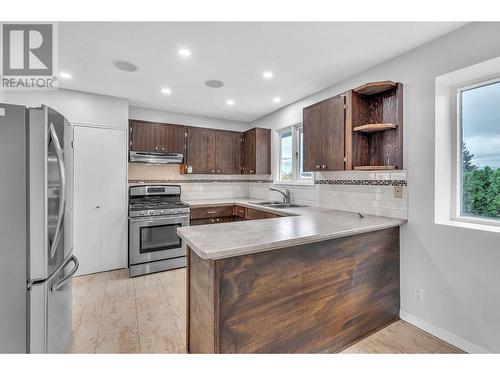 1074 Ollek Street, Kamloops, BC - Indoor Photo Showing Kitchen With Double Sink