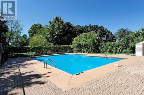 602 - 180 Markham Road, Toronto, ON - Outdoor With In Ground Pool With Backyard