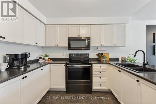 613 Tully Crescent, Peterborough (Monaghan), ON - Indoor Photo Showing Kitchen With Double Sink