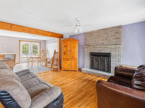 Living room - 2459 Rue De Charlesbourg, Dunham, QC - Indoor Photo Showing Living Room With Fireplace