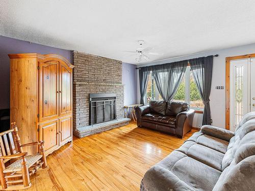 Living room - 2459 Rue De Charlesbourg, Dunham, QC - Indoor Photo Showing Living Room With Fireplace