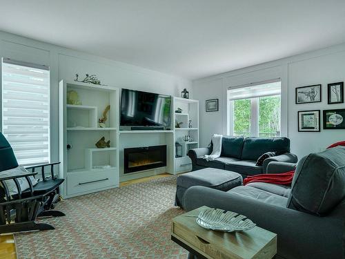 Living room - 3 Rue Bob-Seale, Morin-Heights, QC - Indoor Photo Showing Living Room With Fireplace