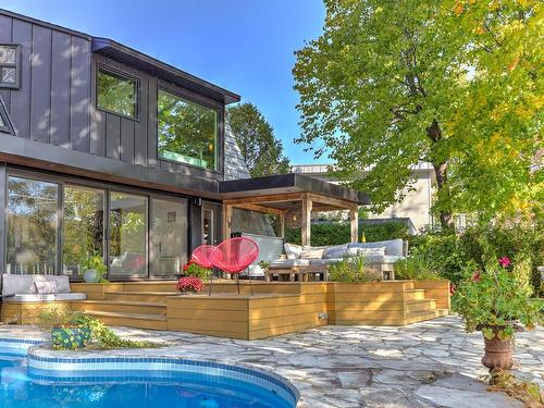 Face arriÃ¨re - 89 Rue Comtois, Laval (Sainte-Dorothée), QC - Outdoor With In Ground Pool With Backyard