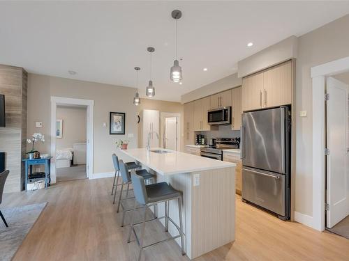 104-2500 Hackett Cres, Central Saanich, BC - Indoor Photo Showing Kitchen With Stainless Steel Kitchen With Upgraded Kitchen