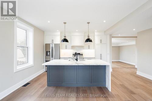 9 Bertram Drive, Springwater, ON - Indoor Photo Showing Kitchen With Upgraded Kitchen