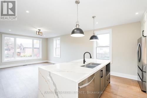 9 Bertram Drive, Springwater, ON - Indoor Photo Showing Kitchen With Double Sink With Upgraded Kitchen