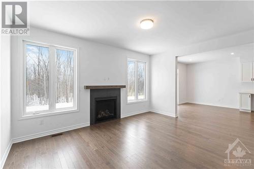 653 Persimmon Way, Ottawa, ON - Indoor Photo Showing Living Room With Fireplace