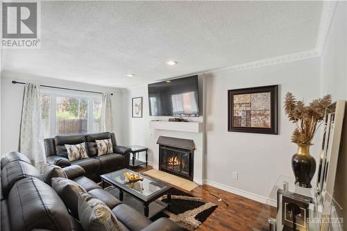 1433 Laurin Crescent, Orleans, ON - Indoor Photo Showing Living Room With Fireplace