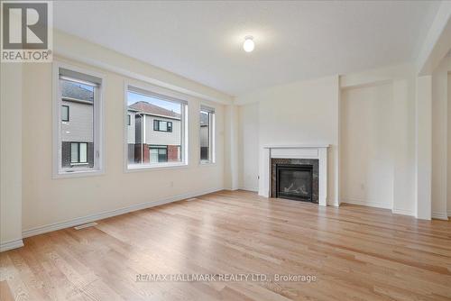 4 Bannister Road, Barrie, ON - Indoor Photo Showing Living Room With Fireplace