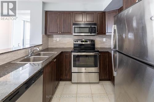 509 - 1040 The Queensway, Toronto, ON - Indoor Photo Showing Kitchen With Double Sink With Upgraded Kitchen