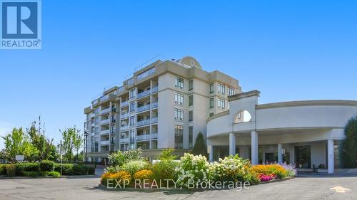 307 - 11121 Yonge Street, Richmond Hill, ON - Outdoor With Balcony With Facade