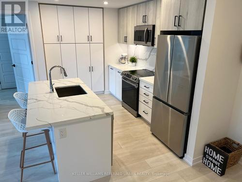 203 - 415 Sea Ray Avenue, Innisfil, ON - Indoor Photo Showing Kitchen With Upgraded Kitchen