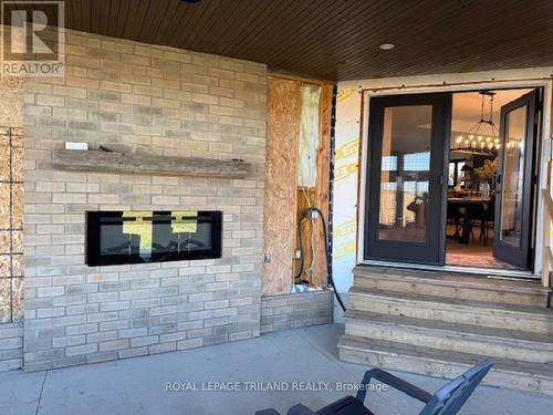 14678 Ten Mile Road, Middlesex Centre (Ilderton), ON - Outdoor With Fireplace