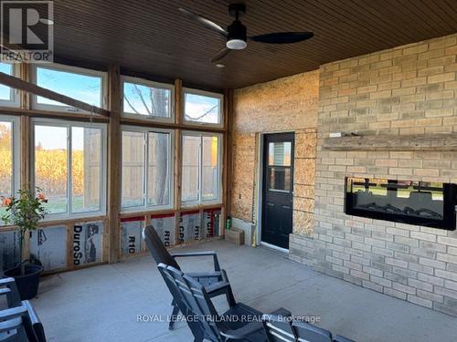 14678 Ten Mile Road, Middlesex Centre (Ilderton), ON - Indoor Photo Showing Other Room With Fireplace