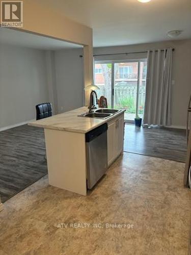 146 - 17 Old Pine Trail, St. Catharines, ON - Indoor Photo Showing Kitchen With Double Sink