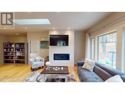 145 The Whins, Cranbrook, BC - Indoor Photo Showing Living Room With Fireplace