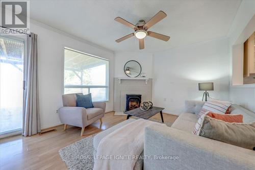 62 Mcknight Crescent, New Tecumseth, ON - Indoor Photo Showing Living Room With Fireplace