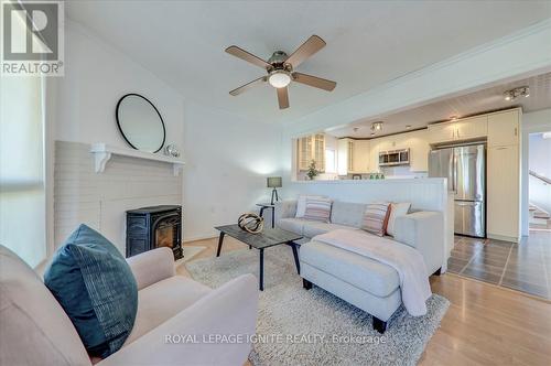 62 Mcknight Crescent, New Tecumseth, ON - Indoor Photo Showing Living Room With Fireplace