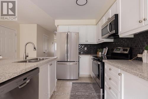 2423 Postmaster Drive, Oakville, ON - Indoor Photo Showing Kitchen With Double Sink