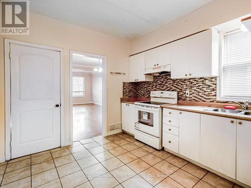 113 Tisdale Street N, Hamilton, ON - Indoor Photo Showing Kitchen With Double Sink