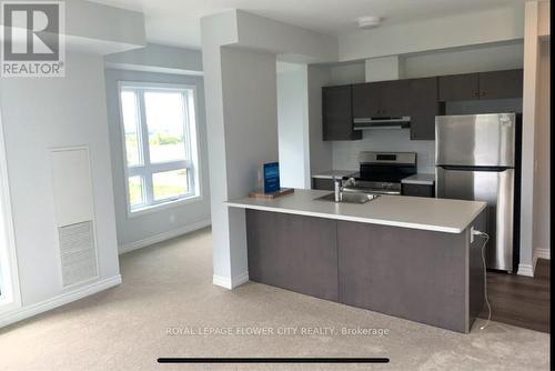 615 - 397 Codds Road, Ottawa, ON - Indoor Photo Showing Kitchen With Stainless Steel Kitchen