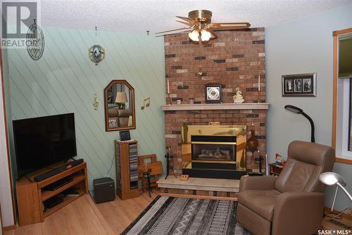 109 Lipton Street, Balcarres, SK - Indoor Photo Showing Living Room With Fireplace