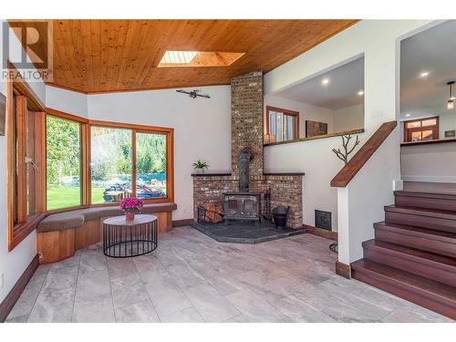 12474 Greystokes Road, Kelowna, BC - Indoor Photo Showing Other Room With Fireplace